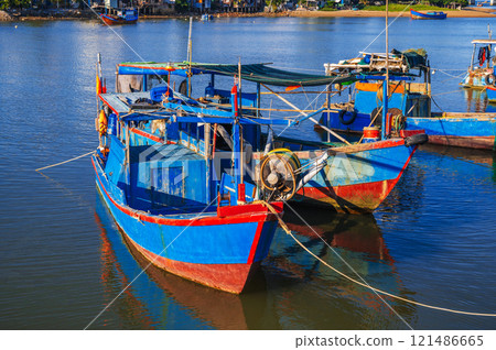 Local fishing harbor with boats in Nha Trang 121486665