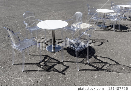 Coffee table with transparent chairs Coffee table with transparent chairs 121487726
