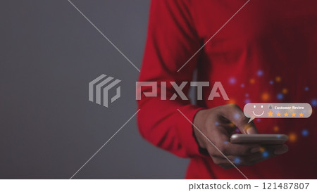 Customer Review, Young Man hand using smartphone mobile with five star to review and give 5 stars Customer Review, Young Man hand using smartphone mobile with five star to review and give 5 stars 121487807