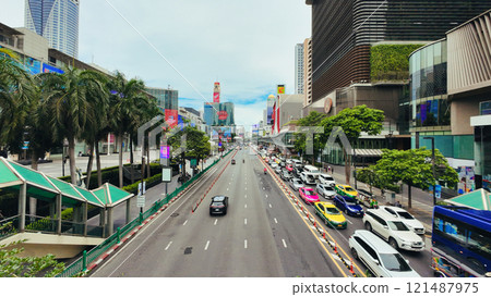 Cars driving on a main road in the city Cars driving on a main road in the city 121487975