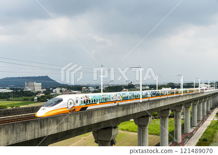 Overlooking view of the Taiwan High Speed Rail Painted trains passing the Waipu of Taichung in Taiwan, It is the only high-speed railway in Taiwan. 121489070