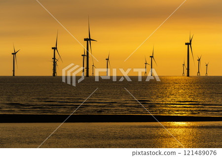 Sunset view of the Offshore wind power systems off the western coast of Taiwan. 121489076