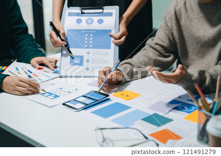 UX graphic designer planning application process development prototype wireframe for web smart phone. 121491279
