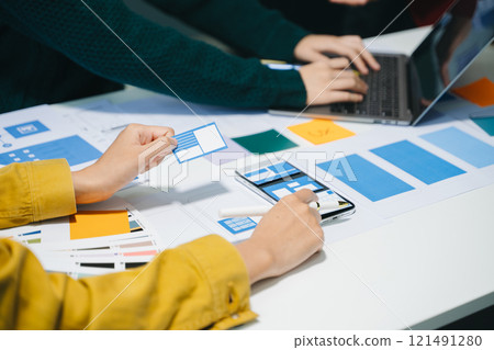 UX graphic designer planning application process development prototype wireframe for web smart phone. 121491280