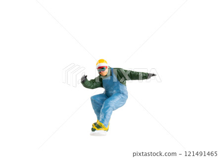 Miniature figurine depicting a snowboarder in mid-motion isolate on white background with clipping path 121491465