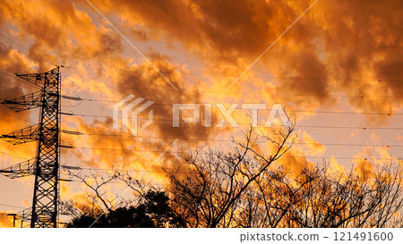 Steel tower and sunset silhouette Steel tower and sunset silhouette 121491600