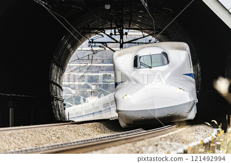 The Shinkansen passing through the Kaseno Tunnel 121492994