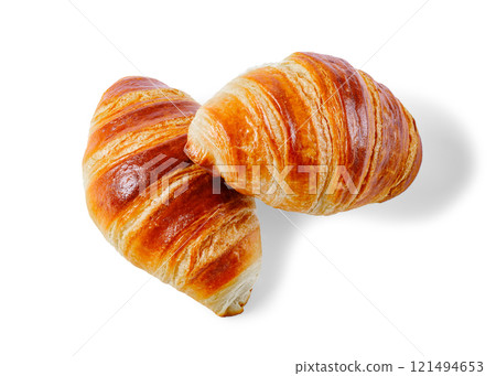 freshly baked in oven croissants isolated on white 121494653