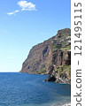 Camara de Lobos Coastline.  The view along the coastline from the fishing village of Camara de Lobos on the Portuguese island of Madeira.  The village was loved by the late Sir Winston Churchill. 121495115