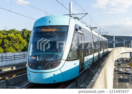 A train traveling on the Danhai Light Rail transit (LRT) in New Taipei City, Taiwan. A train traveling on the Danhai Light Rail transit (LRT) in New Taipei City, Taiwan. 121495937
