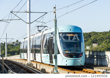 A train traveling on the Danhai Light Rail transit (LRT) in New Taipei City, Taiwan. 121495938