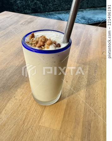 Banana smoothie with granola 121496191