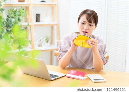 Woman, middle-aged, bankbook, worries 121496231