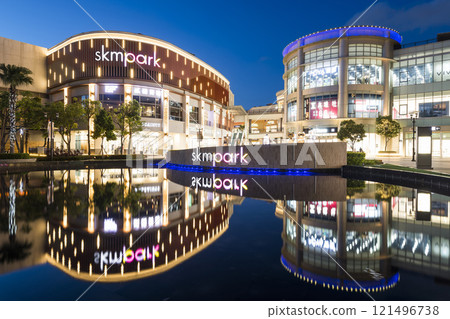 Night view of SKM Park Outlets Kaohsiung, Taiwan. It is a brand-new type of compound lifestyle outlet of Shin Kong Mitsukoshi. Night view of SKM Park Outlets Kaohsiung, Taiwan. It is a brand-new type of compound lifestyle outlet of Shin Kong Mitsukoshi. 121496738