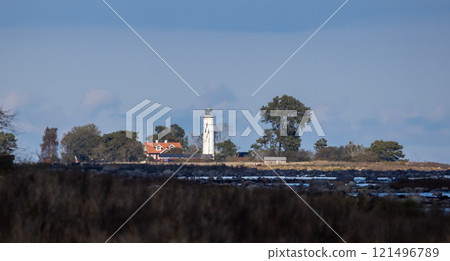 Segerstad lighthouse at the Baltic sea on southeastern Oland, Sweden. Segerstad lighthouse at the Baltic sea on southeastern Oland, Sweden. 121496789