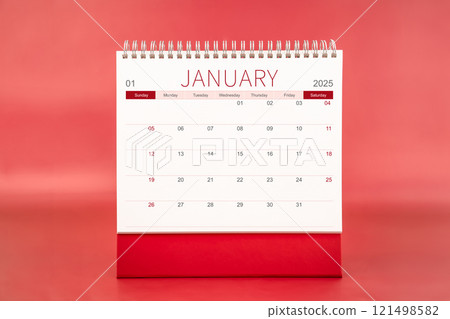 January 2025 blank desk calendar on red color background. January 2025 blank desk calendar on red color background. 121498582