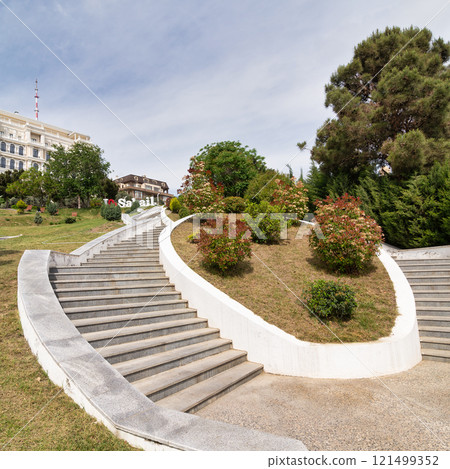 Staircase leading to greenery in Sabail Park, Baku, Azerbaijan under a clear sky Staircase leading to greenery in Sabail Park, Baku, Azerbaijan under a clear sky 121499352