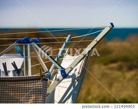 Clothes hanging to dry outdoor Clothes hanging to dry outdoor 121499903