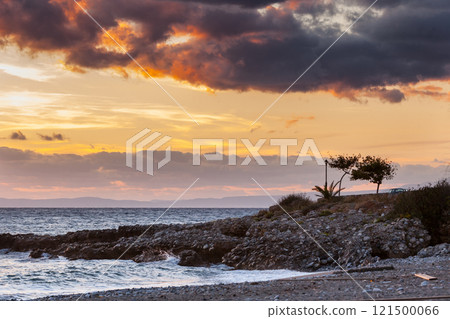 Sunrise or sunset over sea surface 121500066
