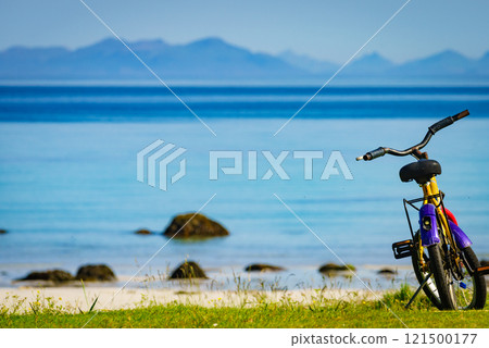 Bike on beach, Lofoten Norway Bike on beach, Lofoten Norway 121500177