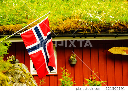 Norwegian flag and house with grass roof Norwegian flag and house with grass roof 121500191