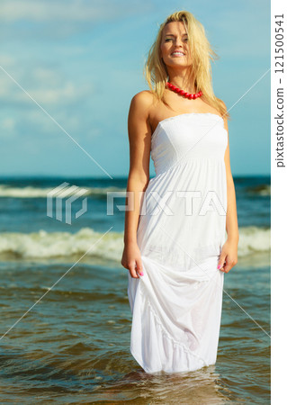 Young woman chilling out on the beach. Young woman chilling out on the beach. 121500541