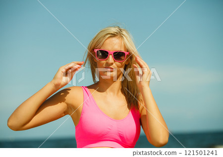 Young girl on beach. 121501241