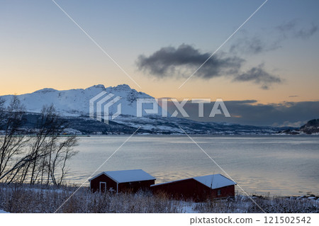 Red cabins, fjord and mountain, Tennevoll, Norway 121502542