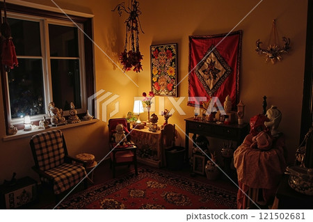 Background image of dimly lit cozy room with traditional Kwanzaa decorations and art copy space 121502681