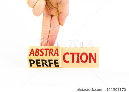 Perfection or abstraction symbol. Concept words Perfection Abstraction on beautiful wooden blocks. Beautiful white background. Businessman hand. Business perfection or abstraction concept. Copy space Perfection or abstraction symbol. Concept words Perfection Abstraction on beautiful wooden blocks. Beautiful white background. Businessman hand. Business perfection or abstraction concept. Copy space 121503170
