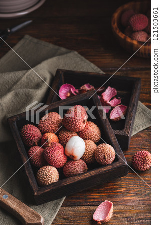 Fresh Fruits of Lychee in Wooden Box 121503661