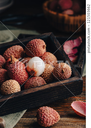 Delicious Lychee Fruits in Rustic Box Delicious Lychee Fruits in Rustic Box 121503662