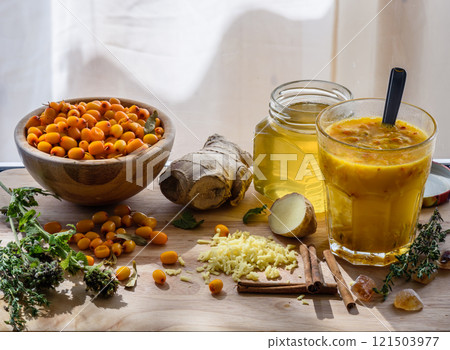 medicinal cocktail of herbs, berries and honey 121503977