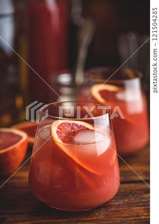 Whiskey sour cocktail with blood orange juice 121504285