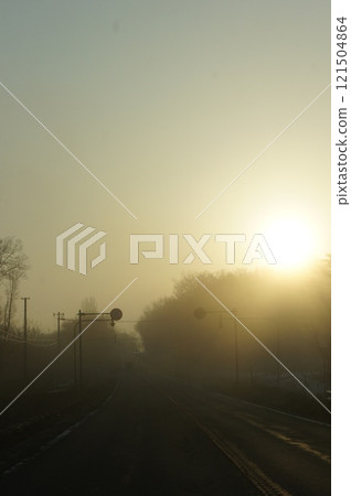 A national highway in Hokkaido with poor visibility due to fog 121504864