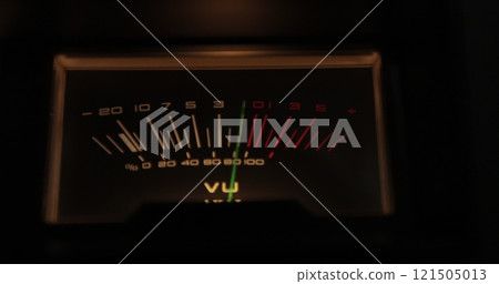 Analog VU meters on classic hi-fi reel-to-reel tape recorder. Retro sound level meter decibel meter in studio, vintage audio equipment. Analog VU meters on classic hi-fi reel-to-reel tape recorder. Retro sound level meter decibel meter in studio, vintage audio equipment. 121505013