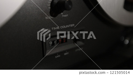 Vintage reel to reel tape professional recorder. Spinning reels on old tape recorder. Vintage reel to reel tape professional recorder. Spinning reels on old tape recorder. 121505014
