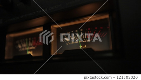 Analog VU meters on classic hi-fi reel-to-reel tape recorder. Retro sound level meter decibel meter in studio, vintage audio equipment. Analog VU meters on classic hi-fi reel-to-reel tape recorder. Retro sound level meter decibel meter in studio, vintage audio equipment. 121505020
