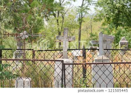 Abandoned graves in a cemetery 121505445