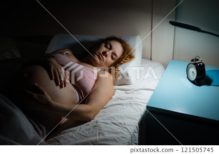 Pregnant woman suffers from insomnia.  121505745