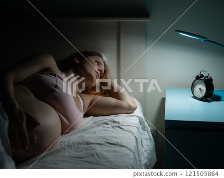 Pregnant woman suffers from insomnia.  121505864