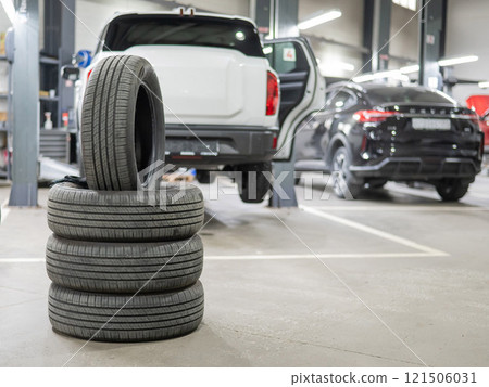Changing tires for a car according to the season. Changing tires for a car according to the season. 121506031