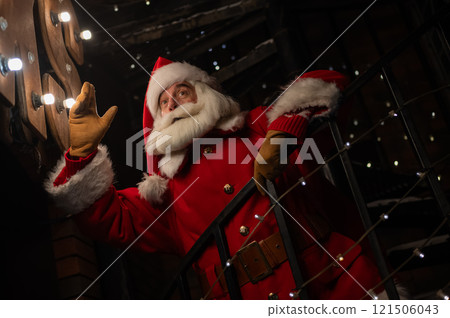 Portrait of Santa Claus in the dark with lights.  121506043