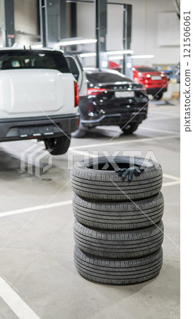 Changing tires for a car according to the season. Changing tires for a car according to the season. 121506061