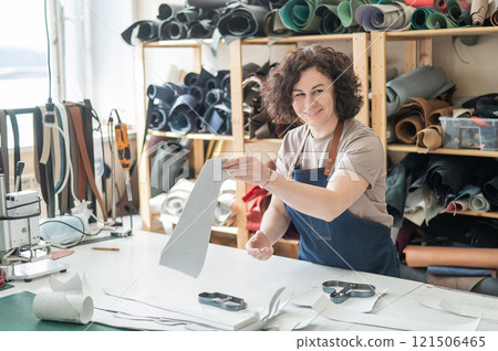 Woman tanner at work in the workshop.  121506465