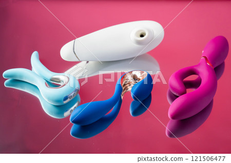 Set of various sex toys on a mirror background.  121506477
