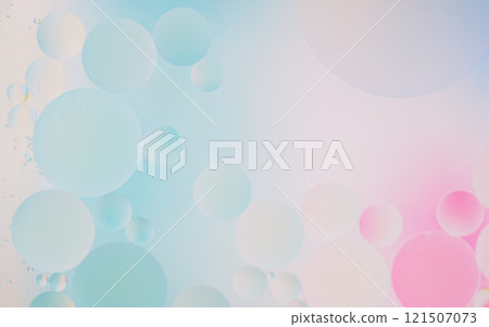 Dreamy abstract background featuring floating pastel bubbles in shades 121507073