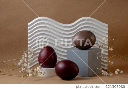Easter Egg Display with Geometric Shapes and natural Background 121507080