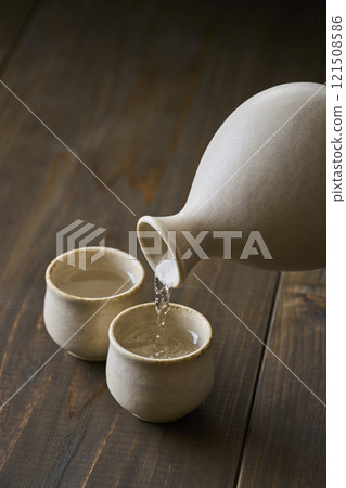 Sake to be poured into your mouth Sake to be poured into your mouth 121508586
