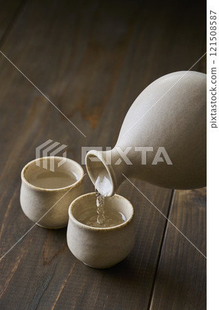 Sake to be poured into your mouth 121508587